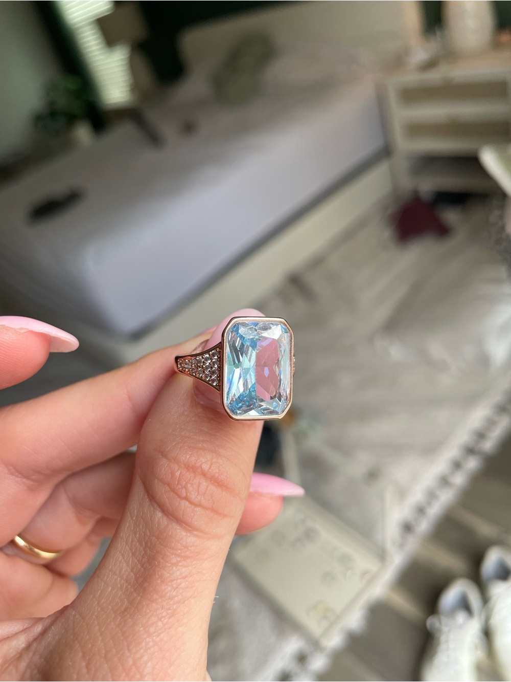 Aquamarine gemstone statement ring on rose gold plating
